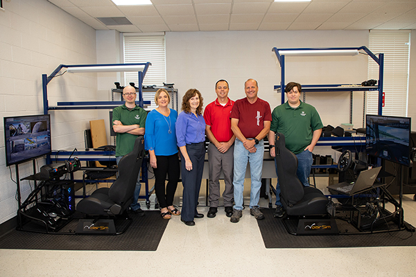 Left to right: Elijah Seals, Motlow Cyber Lab Technician; Sharon Bateman, Motlow Foundation; Angie Parrish, Tri Lakes Sports Car Club Secretary; Brian Oldfield, Tri Lakes Sports Car Club President; Troy Rhoton, Tri Lakes Sports Car Club Treasurer; and Lance Rains, Motlow Cyber Lab Technician.