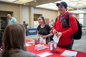Motlow State students Mysti Stotts (left) and Dane Norman network at a Motlow State career fair held earlier this year in Moore County.