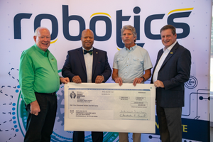 Pictured left to right: Larry Flatt, Executive Director of the Automation and Robotics Training Center; Dr. Michael Torrence, President, Motlow State; Middle TN Natural Gas Warren County Commissioner Fred L. Hoover, III; and Mark Hutchins, Assistant Vice President for Corporate and Foundation Services.