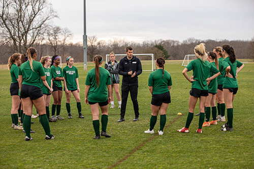 Motlow Women’s Soccer Head Coach Andy Lyon instructs soccer players during practice. 