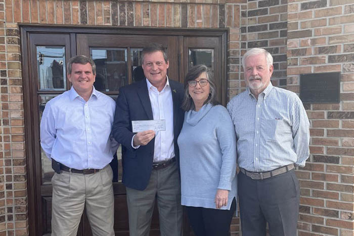 Pictured here: (L-R). Daryl Welch, Assistant General Manager- Harton Realty; J. Mark Hutchins, Motlow College Foundation; Florence Hull, General Partner-Harton Family Partners; Joe Lester, General Manager-Harton Realty