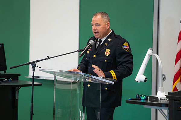 Metro Nashville Fire Department Captain Brian Felts gives a congratulatory speech to the graduates.