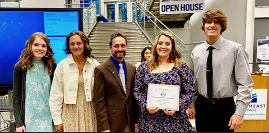 Pictured from left to right: Cloe Campbell, PTK volunteer; Amarah Dove, McMinnville PTK Vice President; Gregg Garrison, Regional Coordinator and Chapter Advisor; Misty Griffith, Chapter Advisor; and Raymond Morton, Vice President of College Project. Not pictured members of the College Project: Ashley Portillo, Sofia Amaya, and Kia Dowen. 