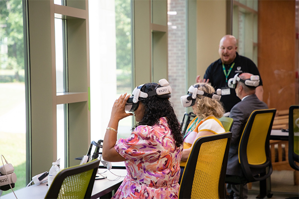 Pictured: Three of the TBR members learning about Motlow’s XR Lab that elevates students’ learning experiences.