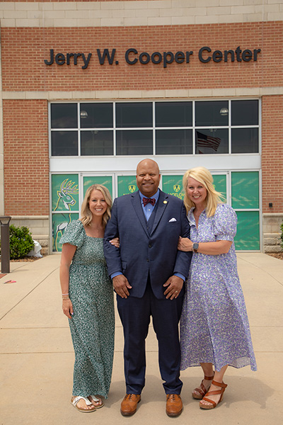 Pictured: Dr. Michael Torrence (middle) with two of Jerry W. Cooper’s daughters, Faith (left) and Sally (right).